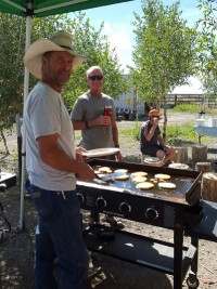 Mike and Steve Saban serving breakfast at the Ranch